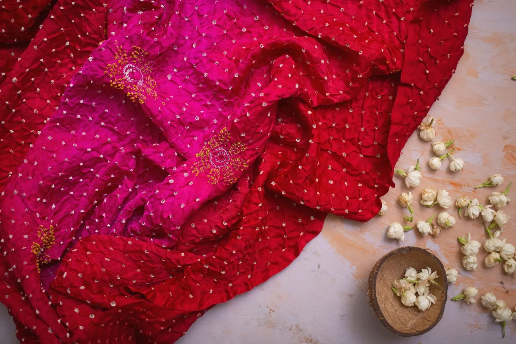 Red and pink bandhani silk with fine tied dots